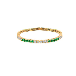 GREEN X WHITE GOLD TENNIS BRACELET